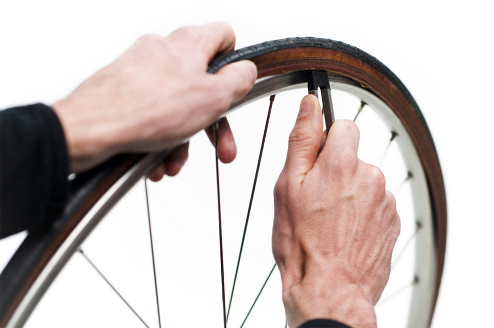 tyre lever on nutter cycle multi tool being used